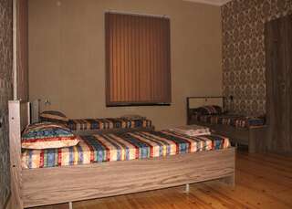 Гостевой дом VM Hostel Гянджа Односпальная кровать в общем номере для мужчин и женщин-5
